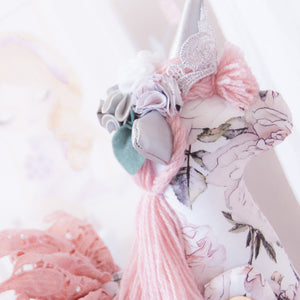 RubyBabyDesigns Keepsake Collective Luxe Unity the Unicorn in a blush pink, white, black, greys and forest green printed cotton. Unicorn featuring faux leather trims, lurex crown and wool blend mane and tail. Finished off with a gorgeous dusty pink embroidered lace tutu skirt. Handmade in Melbourne. Created using cottons, and nylon and filled with environmentally friendly PET fill.