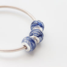 Load image into Gallery viewer, RubyBabyDesigns Keepsake Collective &quot;Sally&quot; Smooth European Bead, created with special inclusions set inside resin. Such as clothing, fabrics, locks of hair, preserved breastmilk, preserved flowers, cremation ashes etc. Sterling Silver inner cores and fit Pandora style bracelets. Handmade in Melbourne.