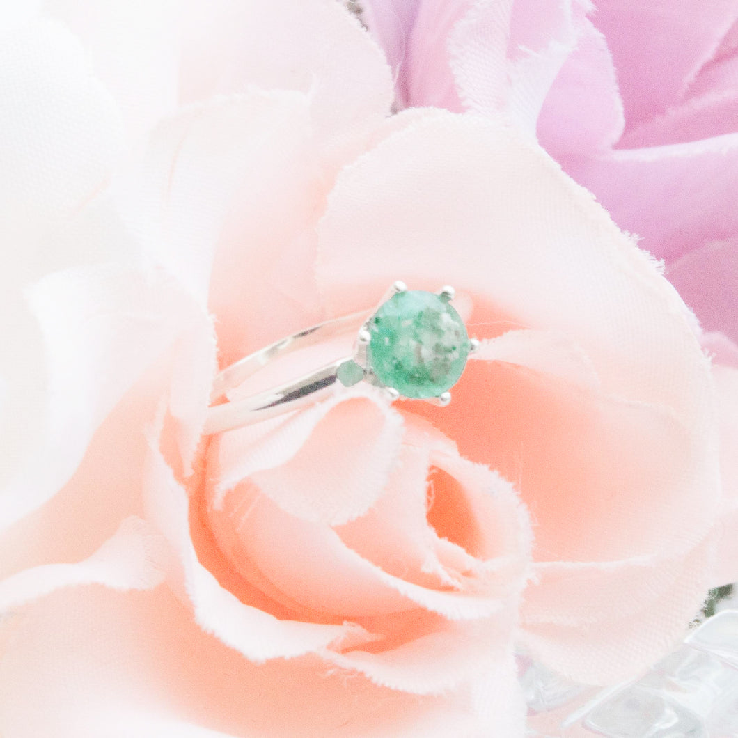 RubyBabyDesigns Keepsake Collective Heirloom Keepsake Ella Elegant Ring featuring a handmade gem featuring inclusions such as cremation ashes, preserved breastmilk or flowers, locks of hair and clothing. Hand crafted gem made in Melbourne. Sterling Silver setting with 6 prongs.