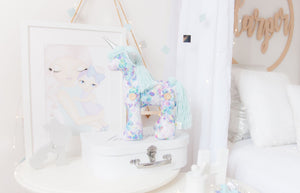 RubyBabyDesigns Keepsake Collective Heirloom Cloth Decor Unity the Unicorn in Classic style. Simply wool blend mane and tail with a lovely mermaid scale inspired print. Handmade engraved wooden buttons on the legs. Faux leather silver horn and ears. Handmade and Designed in Melbourne.