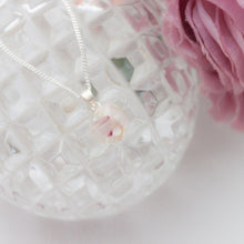 Load image into Gallery viewer, RubyBabyDesigns Keepsake Collective Primrose Pearl Pendant, created using special inclusions such as preserved breastmilk, preserved flowers, locks of hair, cremation ashes, pieces of fabrics and clothing. Handmade in Melbourne.
