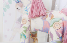 Load image into Gallery viewer, RubyBabyDesigns Keepsake Collective Heirloom Cloth Unicorn Keepsake. Handmade and designed in Melbourne. Created with 100% cotton vintage floral fabric, and wool blend yarn mane and tail. Faux leather ears and horn. 4 x engraved wooden button jointed legs. Approximately 32cm tall. Pet Fill. Vintage retro floral in print features creams, yellow, lilac, browns, dusty rose.